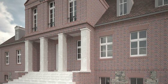Das neue Portal aus Travertin kontrastiert zum Altbau aus Backstein.